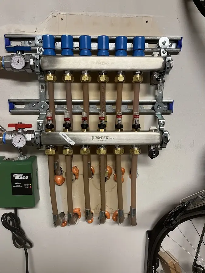 Plumber performing Gas Line Installation at a residential property in Winchendon